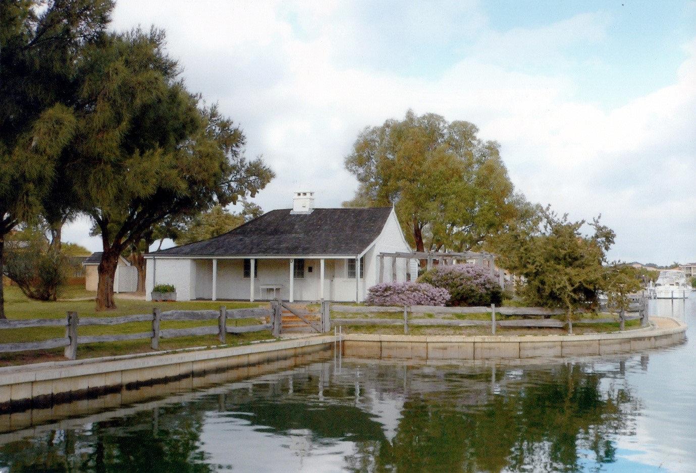 Hall’s Cottage beside the water